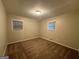 Well-lit bedroom with two windows and neutral decor at 3691 Fred Walker Sw Dr, Smyrna, GA 30082