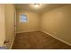Simple bedroom with neutral walls and carpet at 3691 Fred Walker Sw Dr, Smyrna, GA 30082