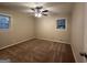 Spacious bedroom with ceiling fan and neutral tones at 3691 Fred Walker Sw Dr, Smyrna, GA 30082