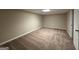 Simple carpeted bedroom with neutral walls and good natural light at 3691 Fred Walker Sw Dr, Smyrna, GA 30082