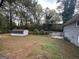Large backyard with storage shed and patio area at 3691 Fred Walker Sw Dr, Smyrna, GA 30082