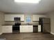 Modern kitchen with stainless steel appliances and granite countertops at 3691 Fred Walker Sw Dr, Smyrna, GA 30082