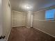 Cozy bedroom with carpet flooring and ample closet space at 2997 Tara Woods Dr, Douglasville, GA 30135