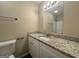 Updated bathroom with granite countertop and new fixtures at 2997 Tara Woods Dr, Douglasville, GA 30135