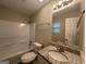 Clean bathroom with granite countertop and bathtub/shower combo at 2997 Tara Woods Dr, Douglasville, GA 30135