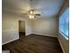 Bright living room featuring hardwood floors and an open floor plan at 2997 Tara Woods Dr, Douglasville, GA 30135