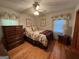 Bright bedroom with hardwood floors, and a double bed at 9267 Westview Sw Dr, Covington, GA 30014