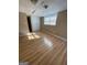 Basement bedroom with laminate wood flooring and double doors at 5003 Pineview Ter, Fayetteville, GA 30214