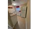 Small basement kitchen with white cabinets and appliances at 5003 Pineview Ter, Fayetteville, GA 30214