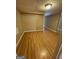 Spacious basement room with light brown laminate flooring at 5003 Pineview Ter, Fayetteville, GA 30214