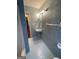 Bathroom with sink, mirror, and light blue walls at 5003 Pineview Ter, Fayetteville, GA 30214