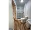 Clean bathroom with a walk-in shower, toilet, and vanity at 5003 Pineview Ter, Fayetteville, GA 30214