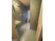 Small bathroom with toilet, sink, and patterned tile floor at 5003 Pineview Ter, Fayetteville, GA 30214