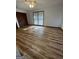 Spacious bedroom with vinyl plank flooring, ceiling fan and windows at 5003 Pineview Ter, Fayetteville, GA 30214