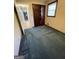 Bedroom with blue carpet, neutral walls, and double doors to closet at 5003 Pineview Ter, Fayetteville, GA 30214