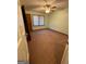 Carpeted bedroom with ceiling fan and ample space at 5003 Pineview Ter, Fayetteville, GA 30214