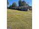 Back of house with deck and large yard at 5003 Pineview Ter, Fayetteville, GA 30214