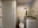 Clean bathroom with shower, toilet and granite vanity at 5950 Community Se Rd, Mableton, GA 30126