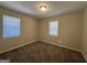 Bedroom with neutral carpeting and window blinds at 5950 Community Se Rd, Mableton, GA 30126