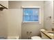 Clean bathroom featuring granite countertop and updated fixtures at 2190 Westover Dr, East Point, GA 30344