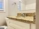 Bathroom vanity with granite countertop and modern sink at 2190 Westover Dr, East Point, GA 30344