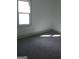 Bright bedroom with carpet and large window at 1511 Mims Sw St, Atlanta, GA 30314