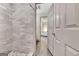 Modern bathroom with a walk-in shower and gray tile at 5 Northlake Cir, Peachtree City, GA 30269