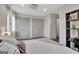 Bright bedroom featuring double closets and stylish decor at 5 Northlake Cir, Peachtree City, GA 30269