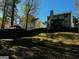 Large backyard with two-story house and gazebo at 1004 Alford Ct, Lithonia, GA 30058
