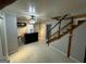 Finished basement with bar and staircase at 1004 Alford Ct, Lithonia, GA 30058