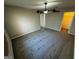 Large bedroom with ceiling fan and carpet at 1004 Alford Ct, Lithonia, GA 30058