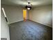 Spacious bedroom with ceiling fan and carpet at 1004 Alford Ct, Lithonia, GA 30058