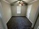 Spacious bedroom with carpet and ceiling fan at 1004 Alford Ct, Lithonia, GA 30058