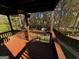 Deck with view of backyard, shed, and wooded area at 1004 Alford Ct, Lithonia, GA 30058