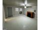 Spacious living room with fireplace and window at 1004 Alford Ct, Lithonia, GA 30058