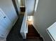 View of staircase from upper level at 1004 Alford Ct, Lithonia, GA 30058