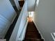 View of staircase leading to the main level at 1004 Alford Ct, Lithonia, GA 30058
