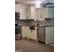Updated kitchen featuring stainless steel appliances and ample cabinet space at 6880 Cumberland Cir, Riverdale, GA 30296