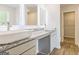 Elegant bathroom with double vanity and modern lighting at 145 Weldon St # 59, Mcdonough, GA 30253