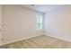 Bedroom with carpet, window, and neutral walls at 145 Weldon St # 59, Mcdonough, GA 30253