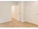 Bedroom with carpet, door to another room, and neutral walls at 145 Weldon St # 59, Mcdonough, GA 30253