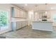 Modern kitchen with island and gray cabinets at 145 Weldon St # 59, Mcdonough, GA 30253
