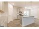 Modern kitchen with granite countertops and island at 145 Weldon St # 59, Mcdonough, GA 30253