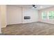 Open living room with fireplace and neutral wall colors at 145 Weldon St # 59, Mcdonough, GA 30253