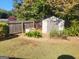 Private backyard with shed and well-maintained lawn at 2644 Laurel Nw Ln, Kennesaw, GA 30152