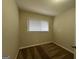 Cozy carpeted bedroom with a window and neutral walls at 2233 Springdale Sw Cir, Atlanta, GA 30315