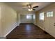 Bright living room featuring hardwood floors and a ceiling fan at 2233 Springdale Sw Cir, Atlanta, GA 30315