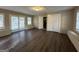 Sunroom with built-in seating and access to the backyard at 245 Remington Trl, Ellenwood, GA 30294
