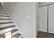 Interior staircase with white risers and dark wood treads at 254 Twiggs Corner, Peachtree City, GA 30269