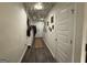 Bright hallway with decorative ceiling and hardwood floors at 142 Hampton Cir, Mcdonough, GA 30253